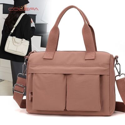 Τσάντα Crossbody Εμπνευσμένη από retro Πολυδιάστατη Νάιλον Τότ με απλή αλλά κομψή μετακίνηση